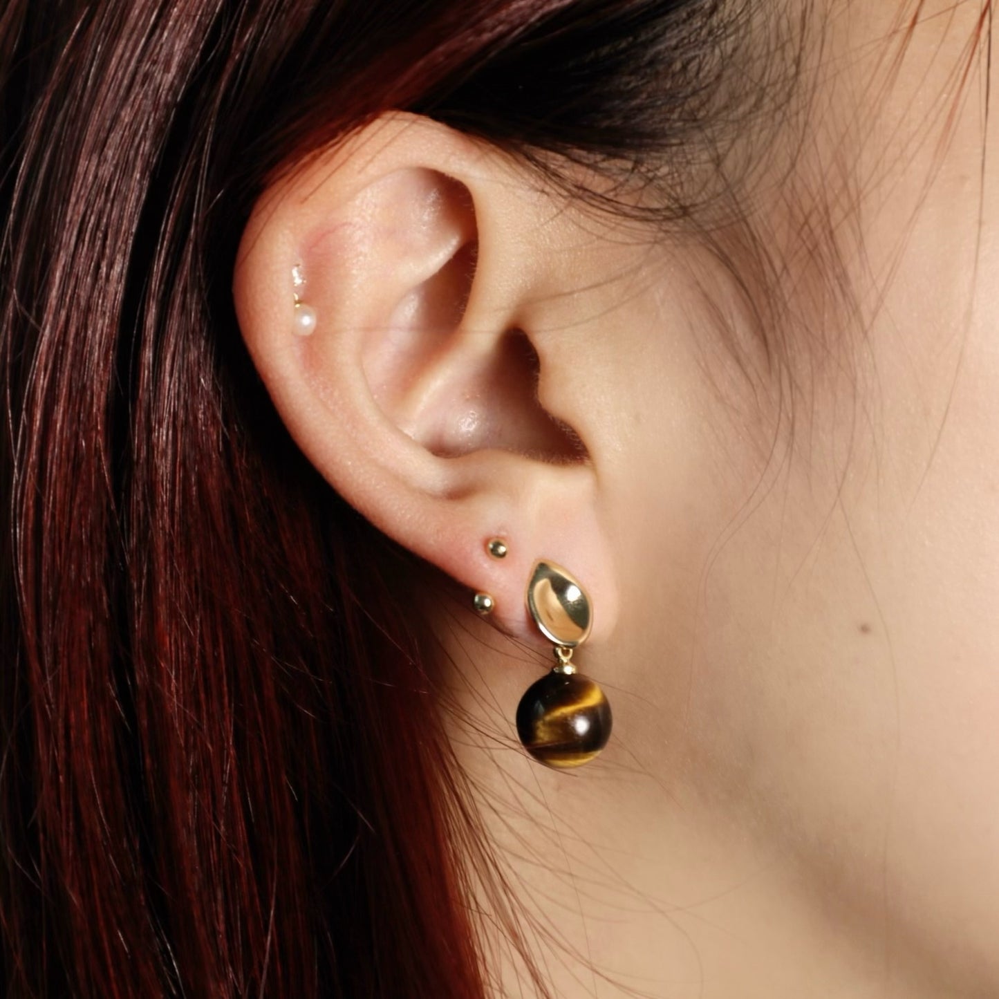 tigerite earrings | achievement